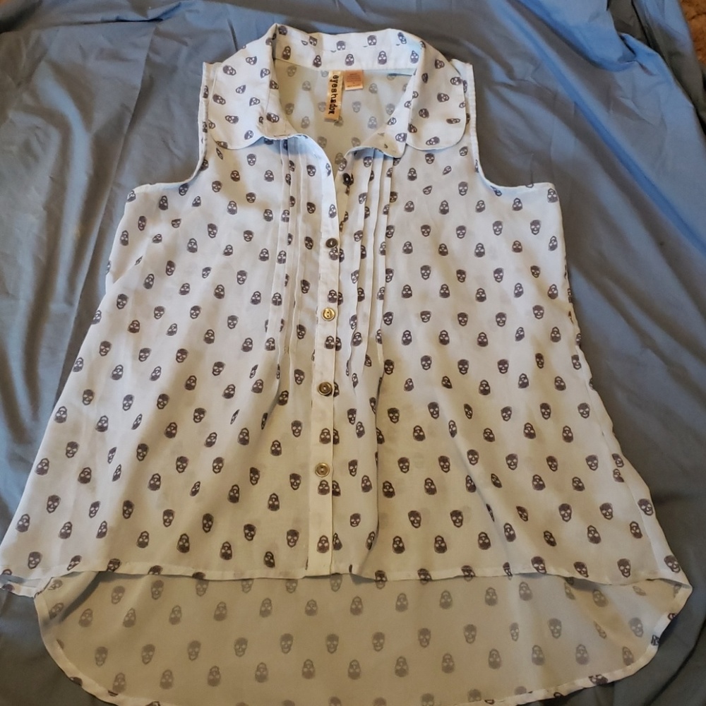 Pale blue sheer top with skulls